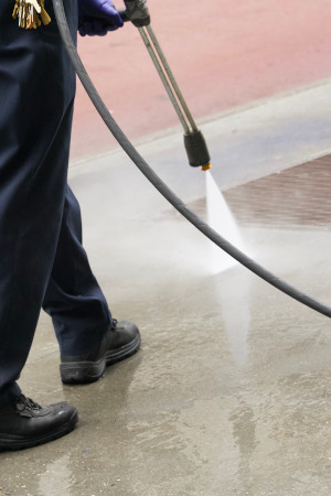 washing concrete sidewalk