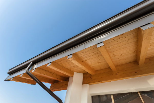 Rain gutter on the roof ecological house